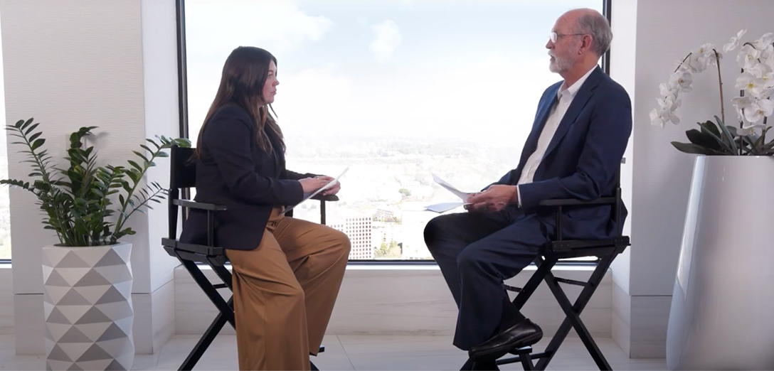 Sabrina Unger and Jay Butterfield sit together talking about the role of real estate in a portfolio. The timing for the video is 9:04.