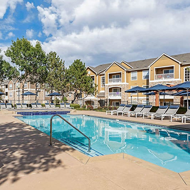 Apartment community with outdoor pool and clubhouse