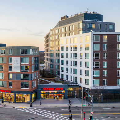 Apartment complex with retail shops on ground floor
