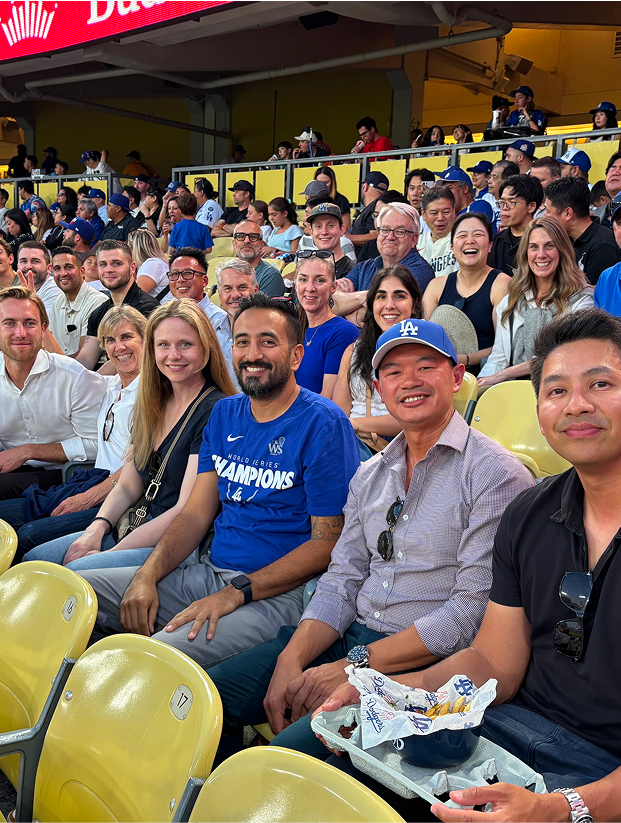 Colleagues seated together at company event