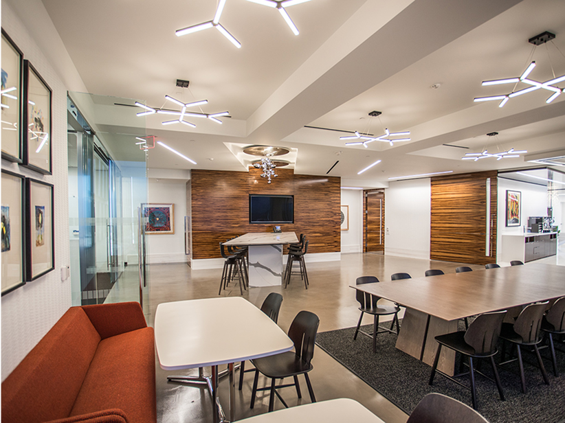 Office common area with tables and chairs